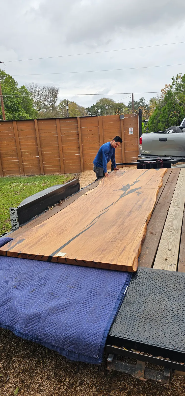 Live edge dining slab loaded on a trailer for same-day pickup