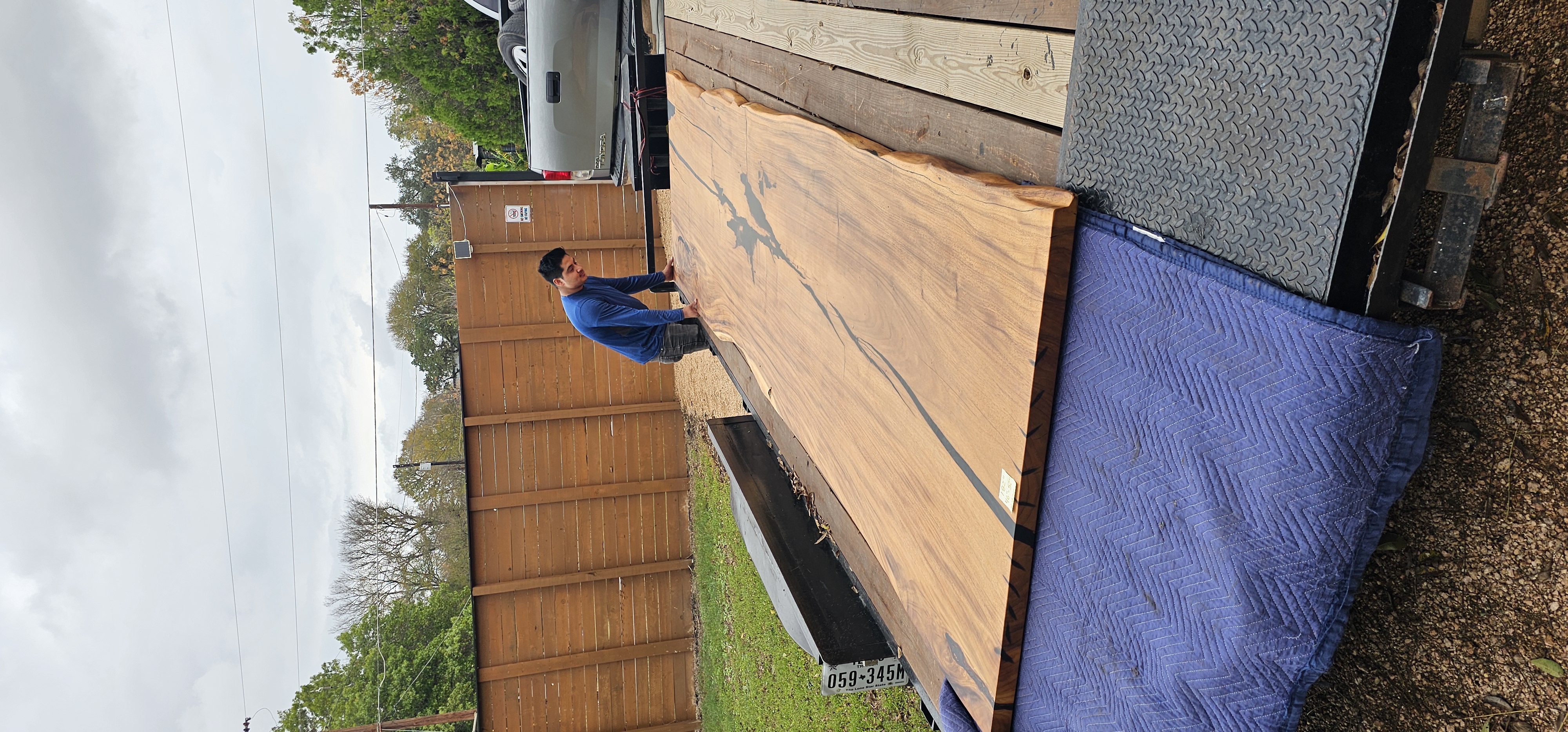 Live edge dining slab loaded on a trailer for same-day pickup