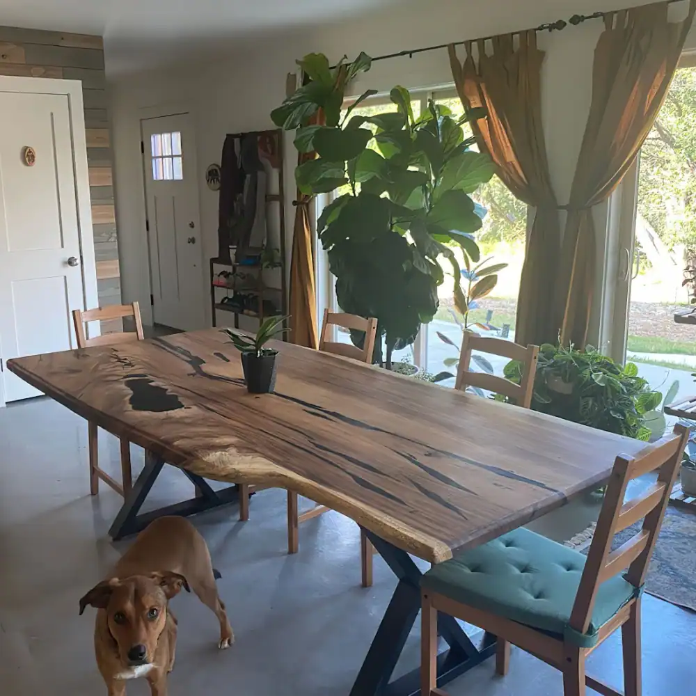 Black epoxy live edge table purchased by Logan Barlley